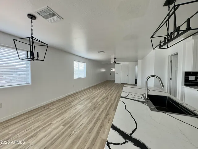 a view of a workspace with furniture