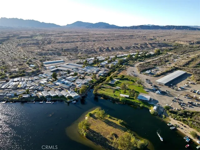 an aerial view of residential house with lake view