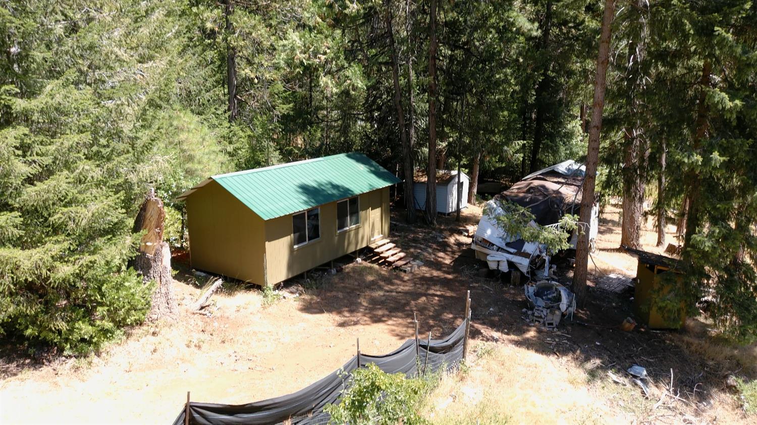 3772 Tin Ranch Road Georgetown, CA 95634 - Photo 9 of 13 a view of a backyard with sitting area