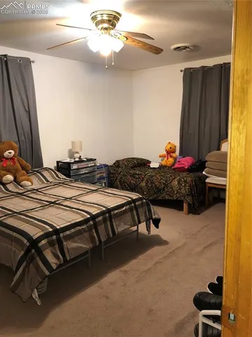 a bathroom with a toilet and a sink