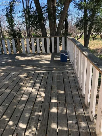 a kitchen with a table and chairs in it