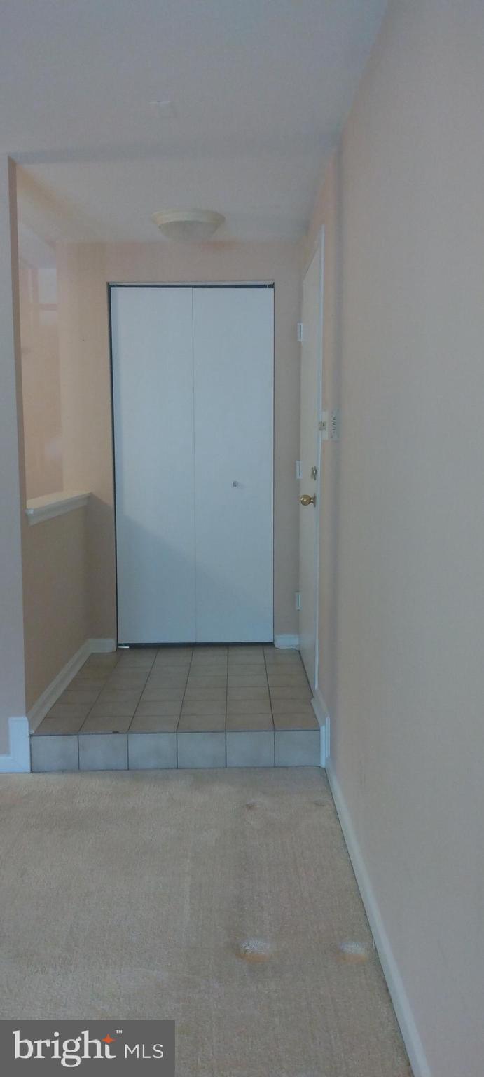4912 Columbia Road, Unit 1 110 Columbia, MD 21044 - Photo 11 of 59 Foyer and Coat Closet