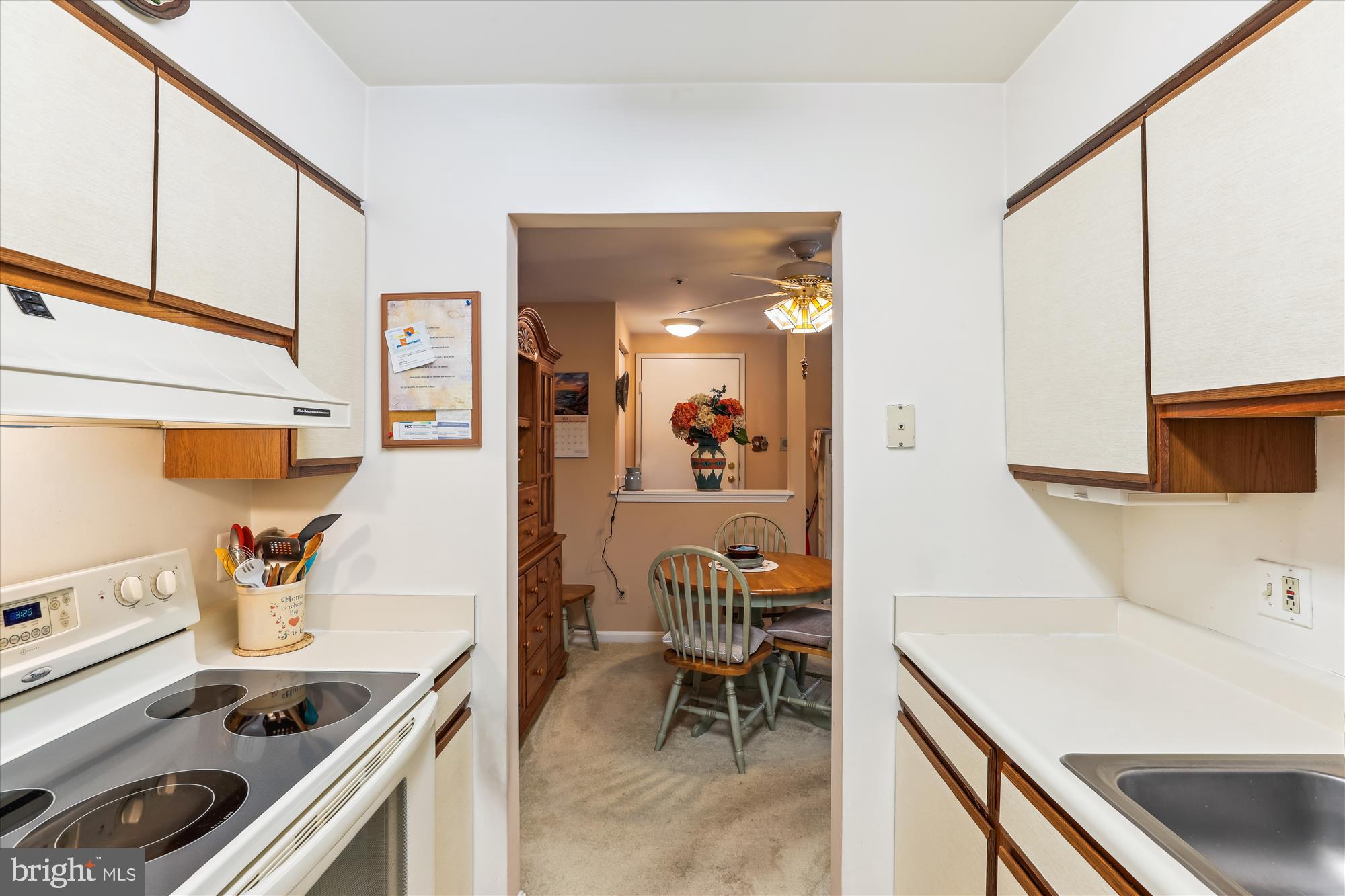 4912 Columbia Road, Unit 1 110 Columbia, MD 21044 - Photo 19 of 59 a kitchen with a stove and a sink