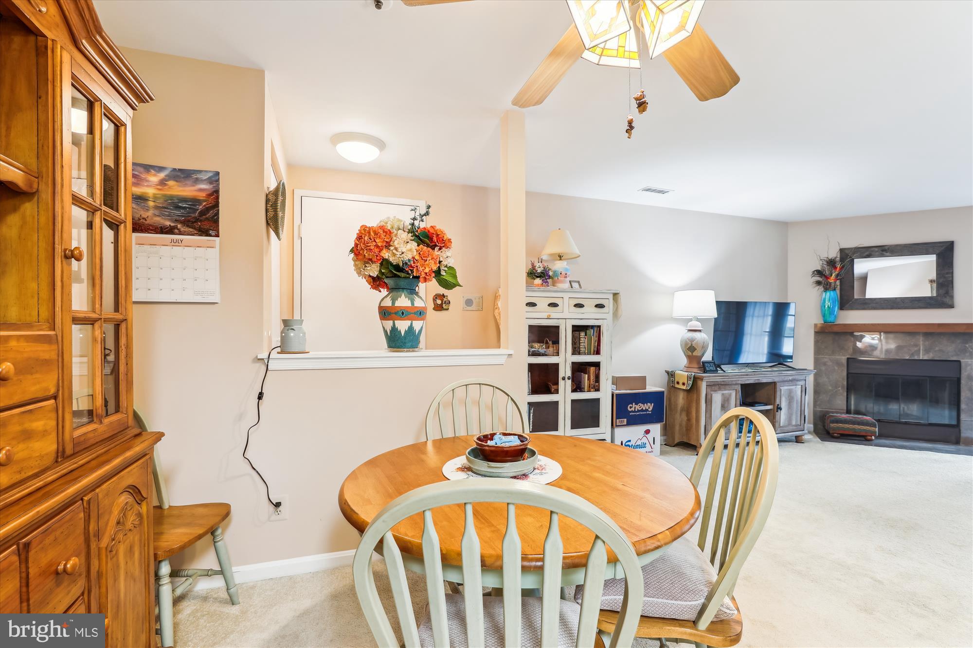 4912 Columbia Road, Unit 1 110 Columbia, MD 21044 - Photo 20 of 59 a bedroom with furniture and a fireplace