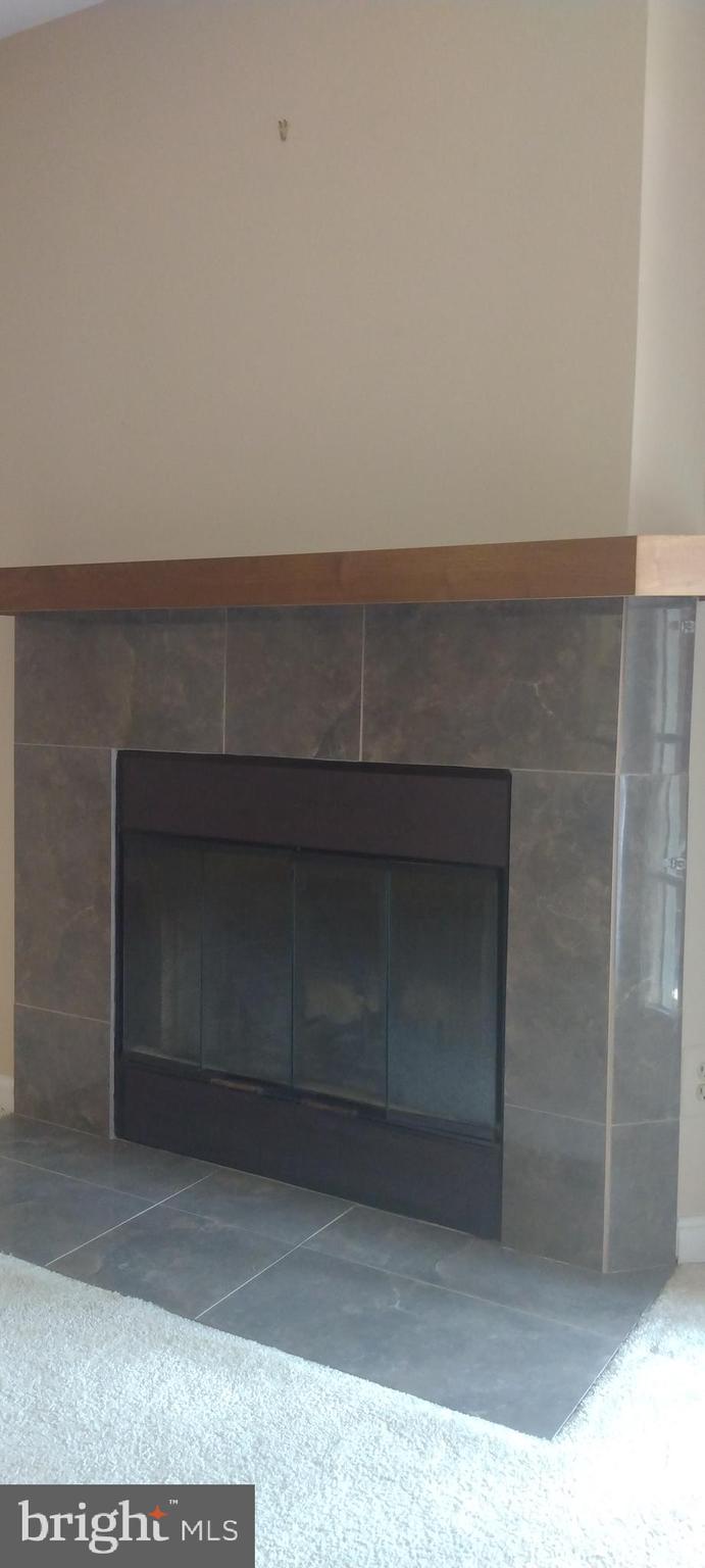 4912 Columbia Road, Unit 1 110 Columbia, MD 21044 - Photo 24 of 59 a living room with a door