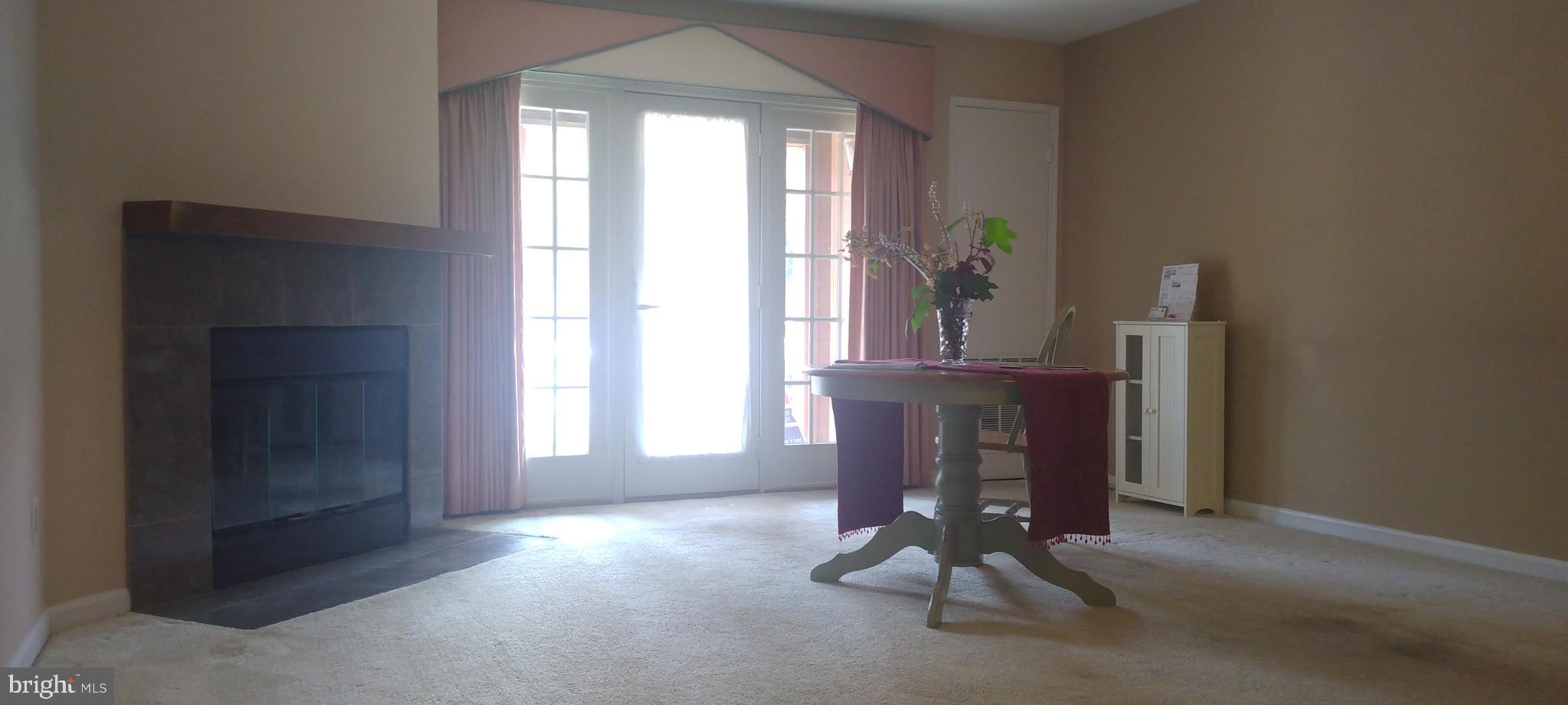 4912 Columbia Road, Unit 1 110 Columbia, MD 21044 - Photo 25 of 59 a living room with furniture and a window