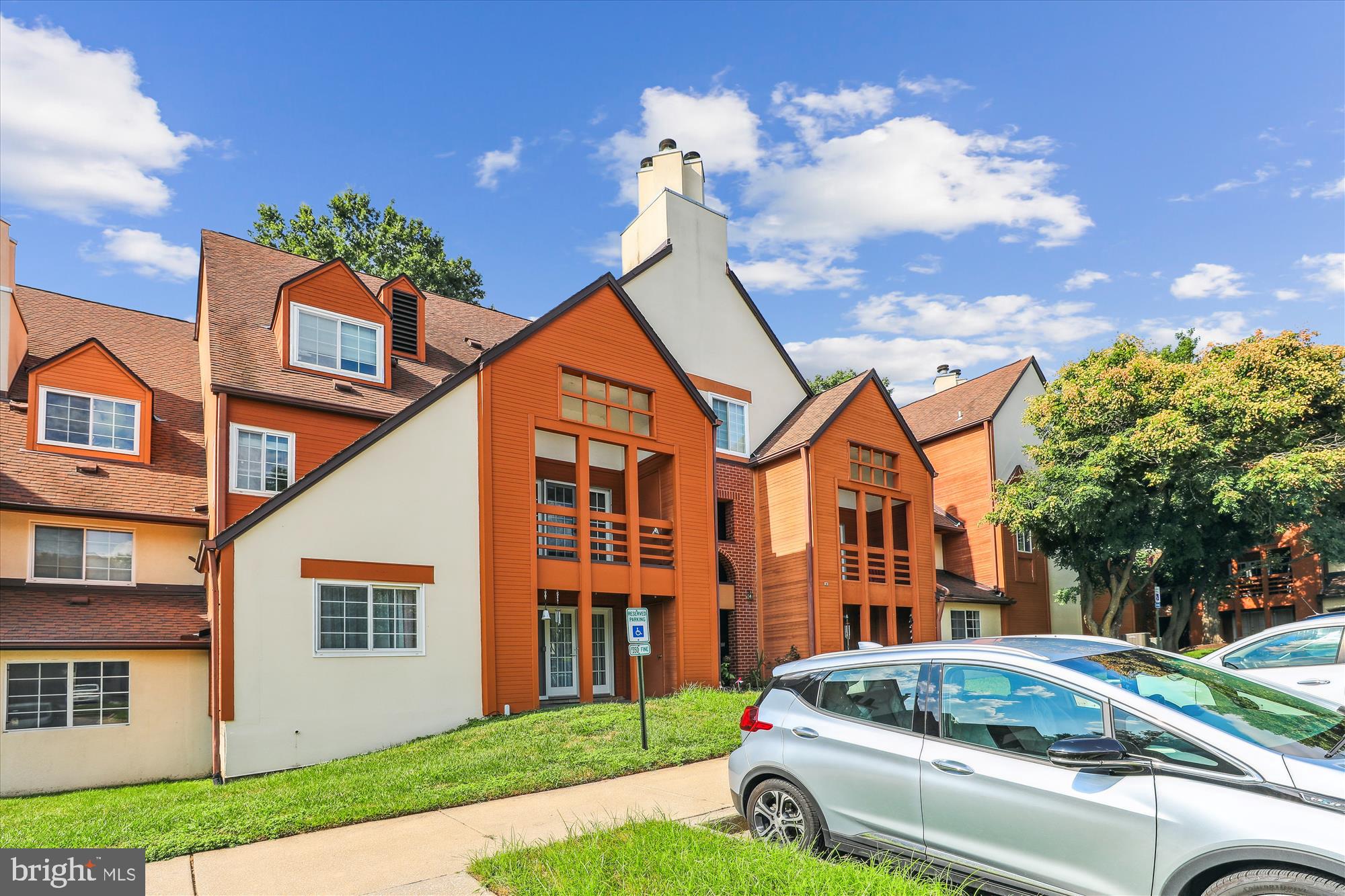 4912 Columbia Road, Unit 1 110 Columbia, MD 21044 - Photo 3 of 59 a front view of a house with garden