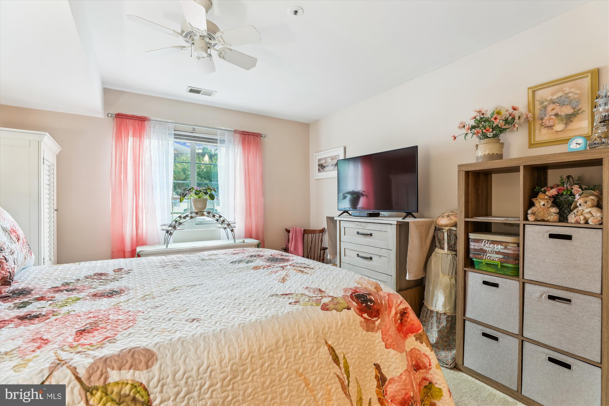 4912 Columbia Road, Unit 1 110 Columbia, MD 21044 - Photo 32 of 59 a bedroom with a bed and flat screen tv