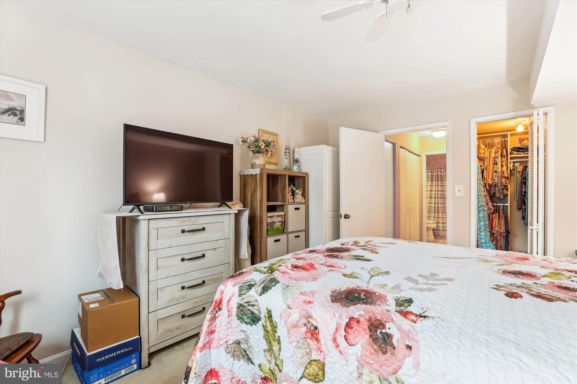 4912 Columbia Road, Unit 1 110 Columbia, MD 21044 - Photo 33 of 59 a bedroom with a bed and a flat screen tv