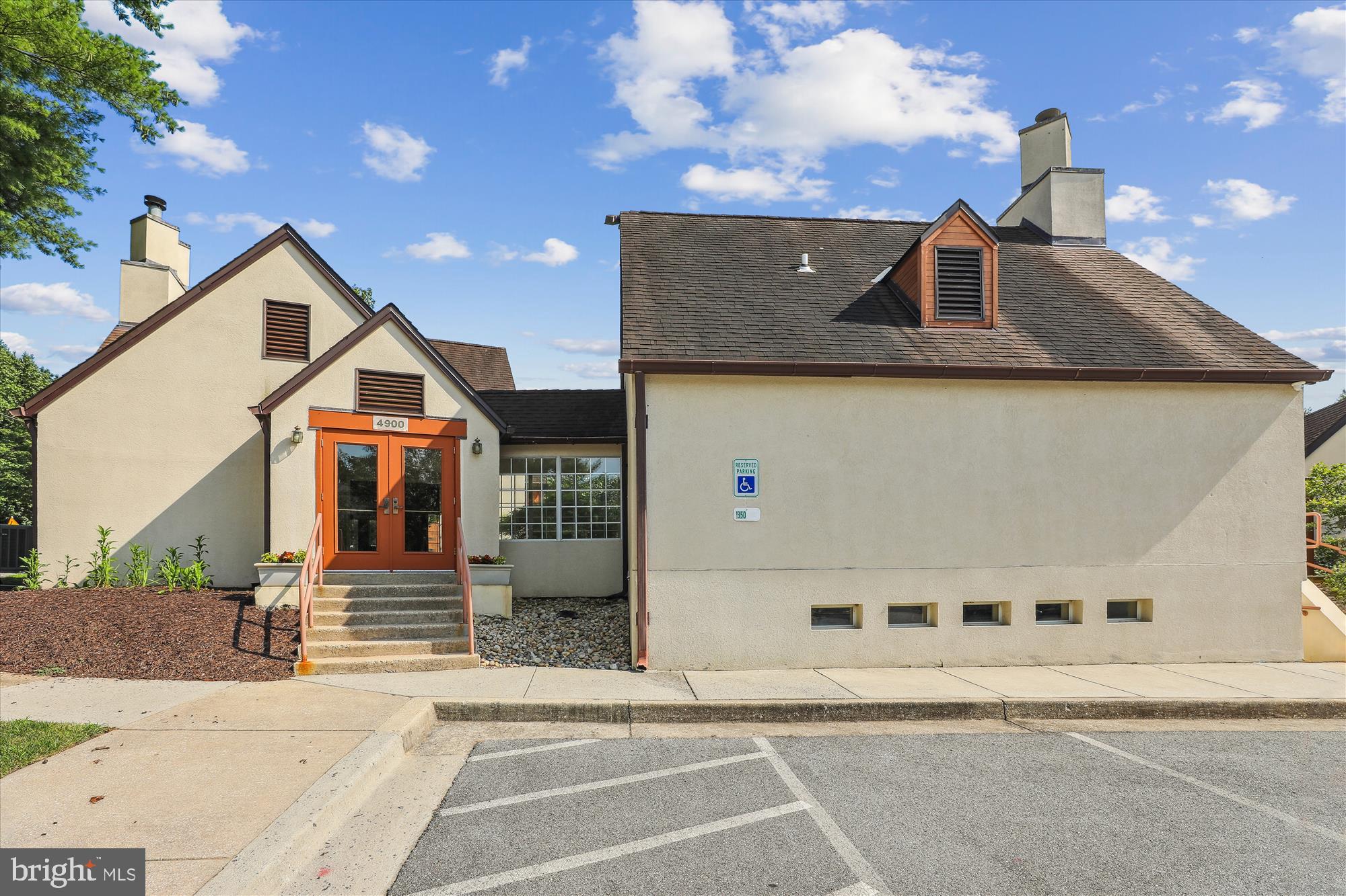 4912 Columbia Road, Unit 1 110 Columbia, MD 21044 - Photo 43 of 59 a front view of a house with a street