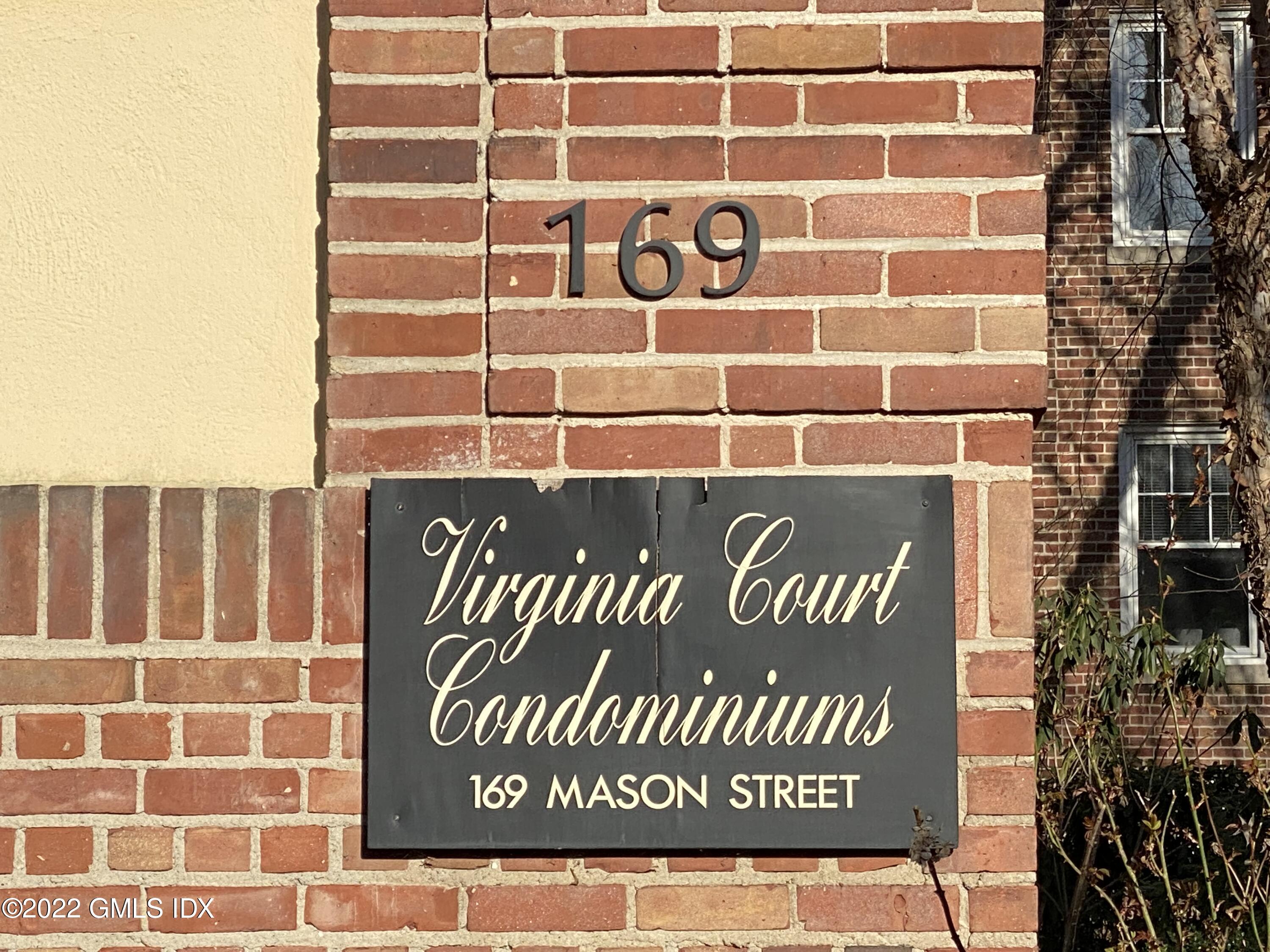 169 Mason Street, Unit 1F Greenwich, CT 06830 - Photo 2 of 14 a sign on the side of a building