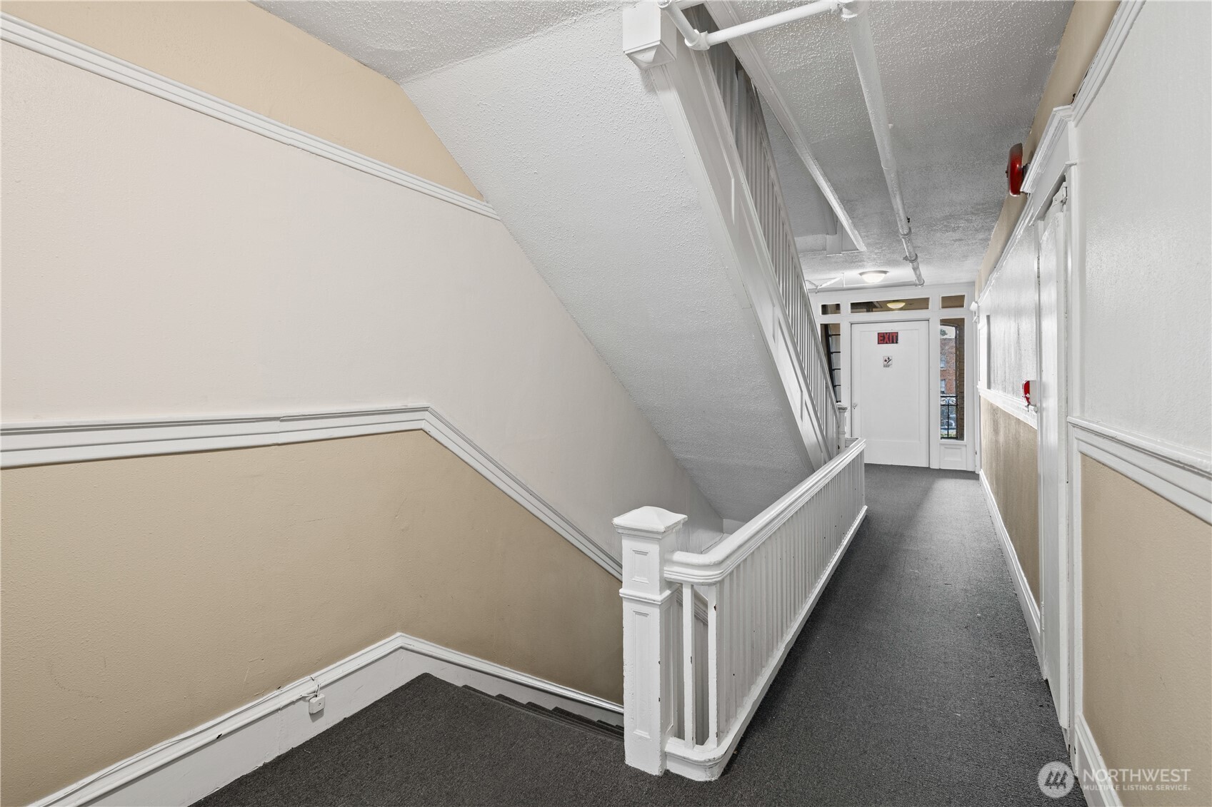 321 Broadway East Seattle, WA 98102 - Photo 17 of 38 a view of a hallway with stairs