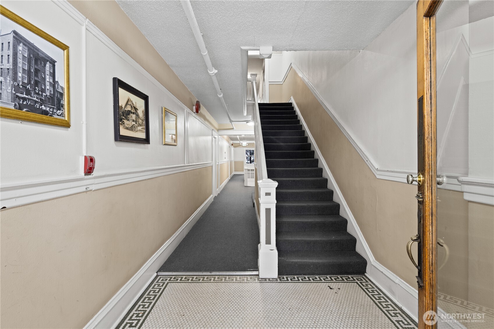 321 Broadway East Seattle, WA 98102 - Photo 4 of 38 a view of entryway and hall with wooden floor