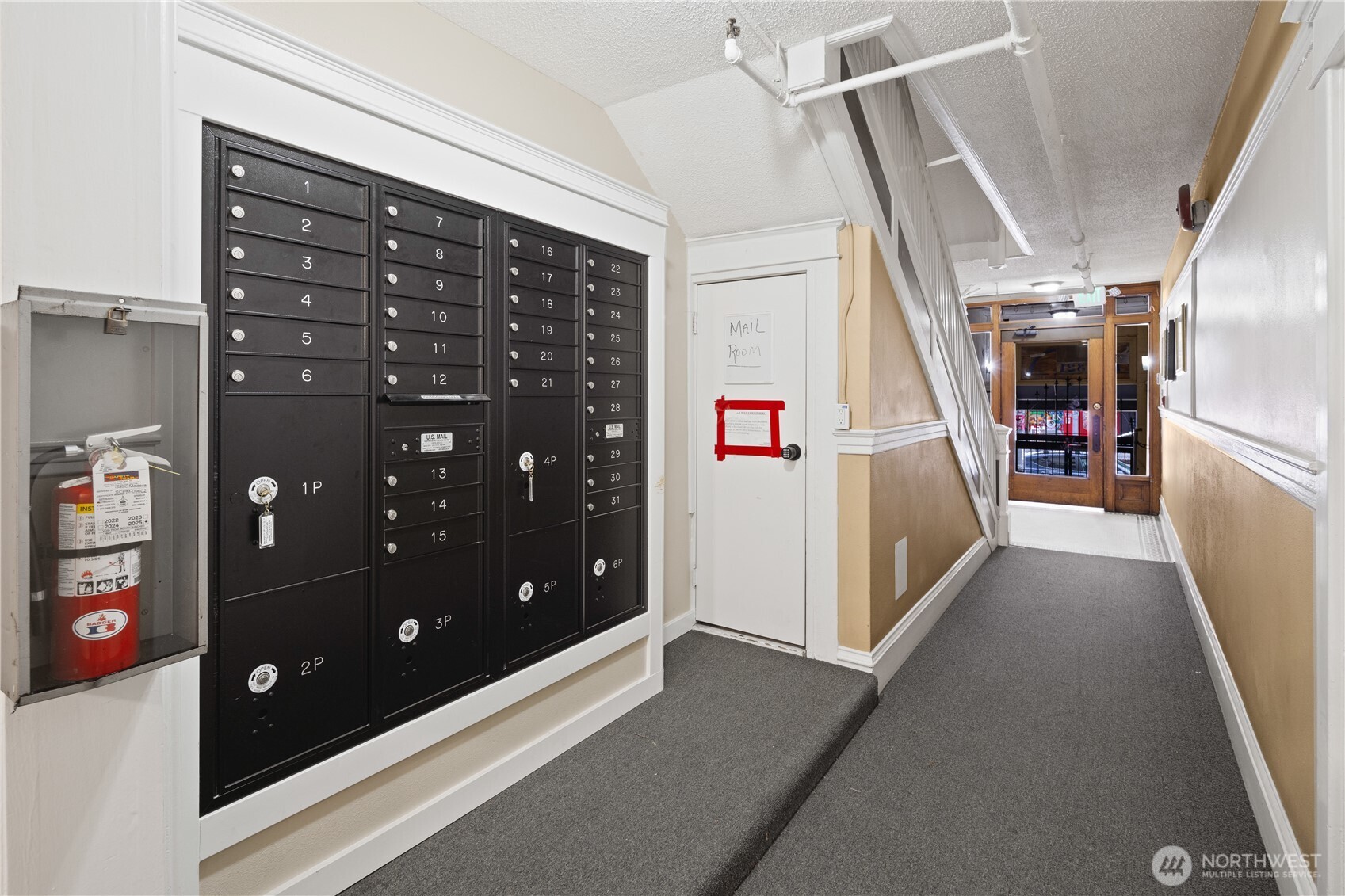 321 Broadway East Seattle, WA 98102 - Photo 5 of 38 a view of a hallway with seating area