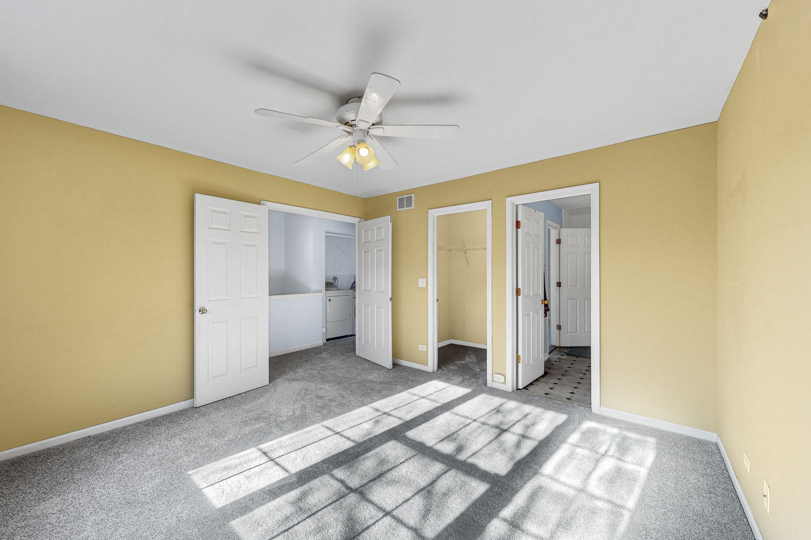 1645 Apple Tree Lane West Chicago, IL 60185 - Photo 11 of 20 a view of a big room with wooden floor and closet area