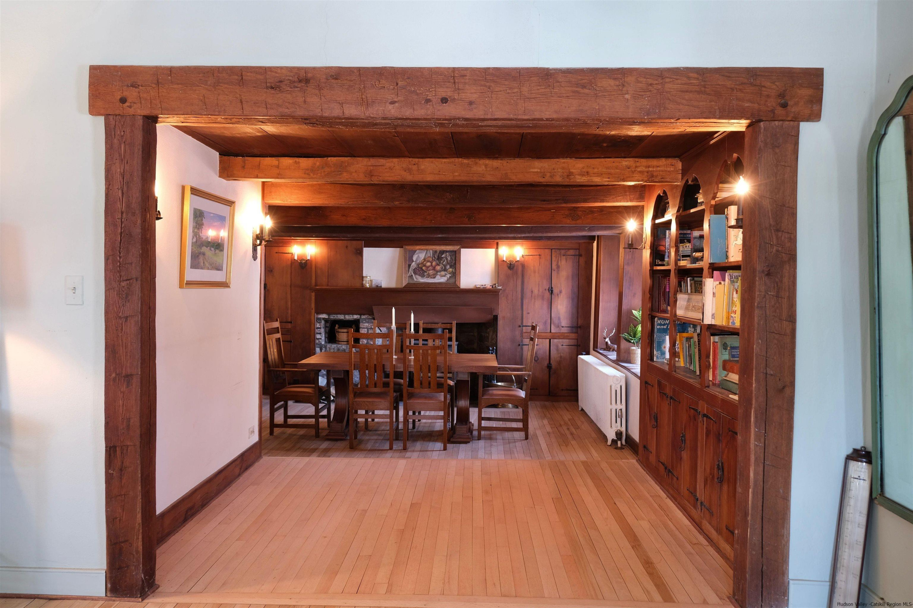 115 Buck Road Stone Ridge, NY 12484 - Photo 13 of 35 a view of a dining room with furniture and wooden floor