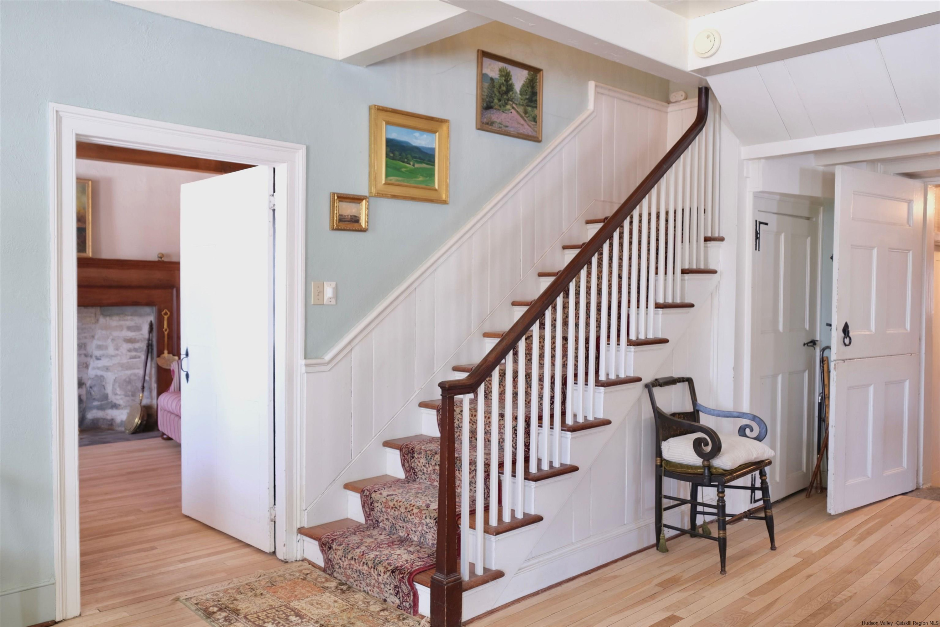 115 Buck Road Stone Ridge, NY 12484 - Photo 18 of 35 a view of entryway and hall with wooden floor