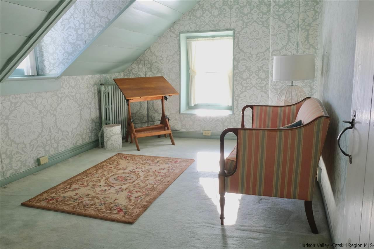 115 Buck Road Stone Ridge, NY 12484 - Photo 22 of 35 view of living room with furniture and a rug