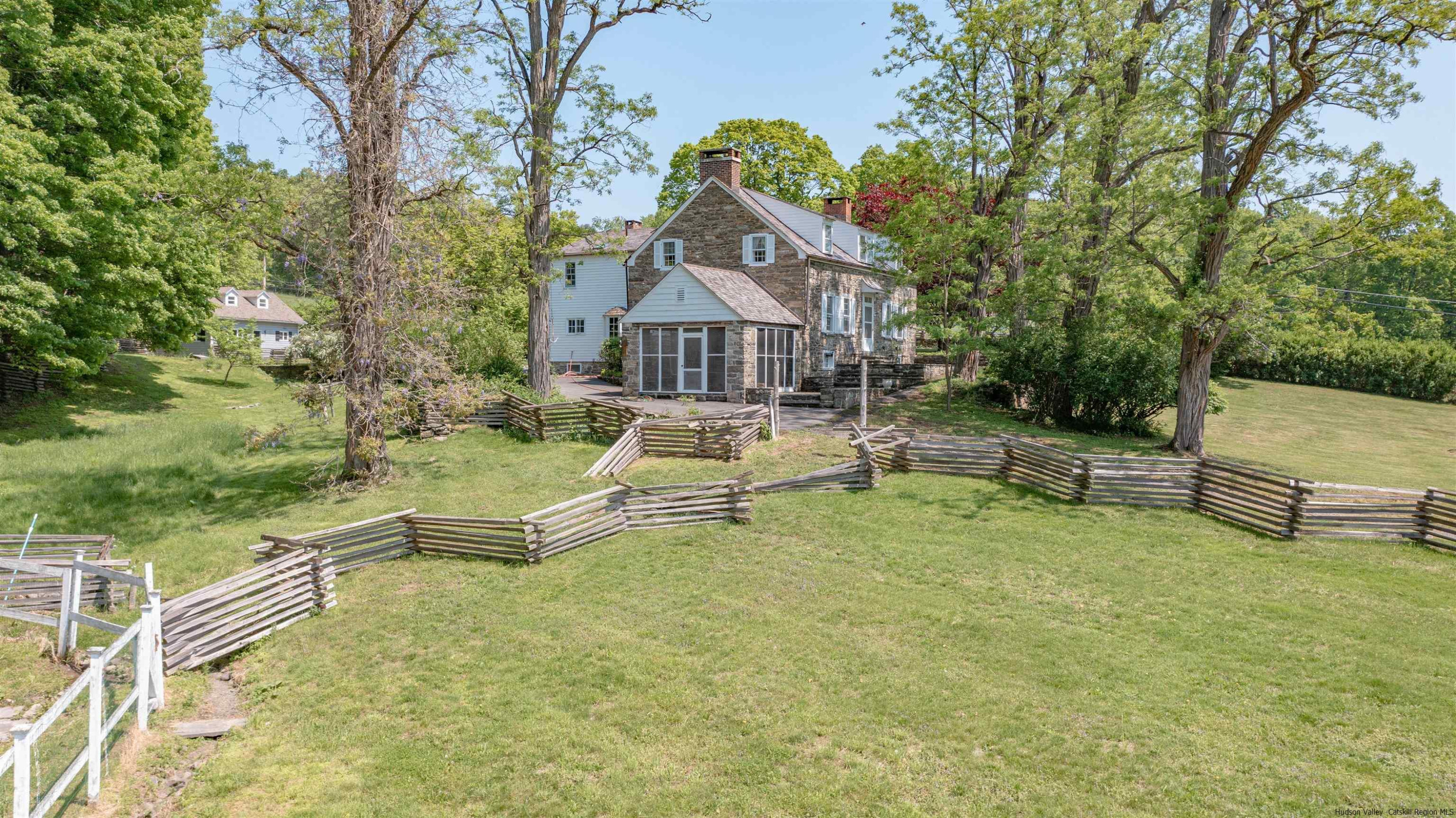 115 Buck Road Stone Ridge, NY 12484 - Photo 3 of 35 a house view with a sitting space and garden
