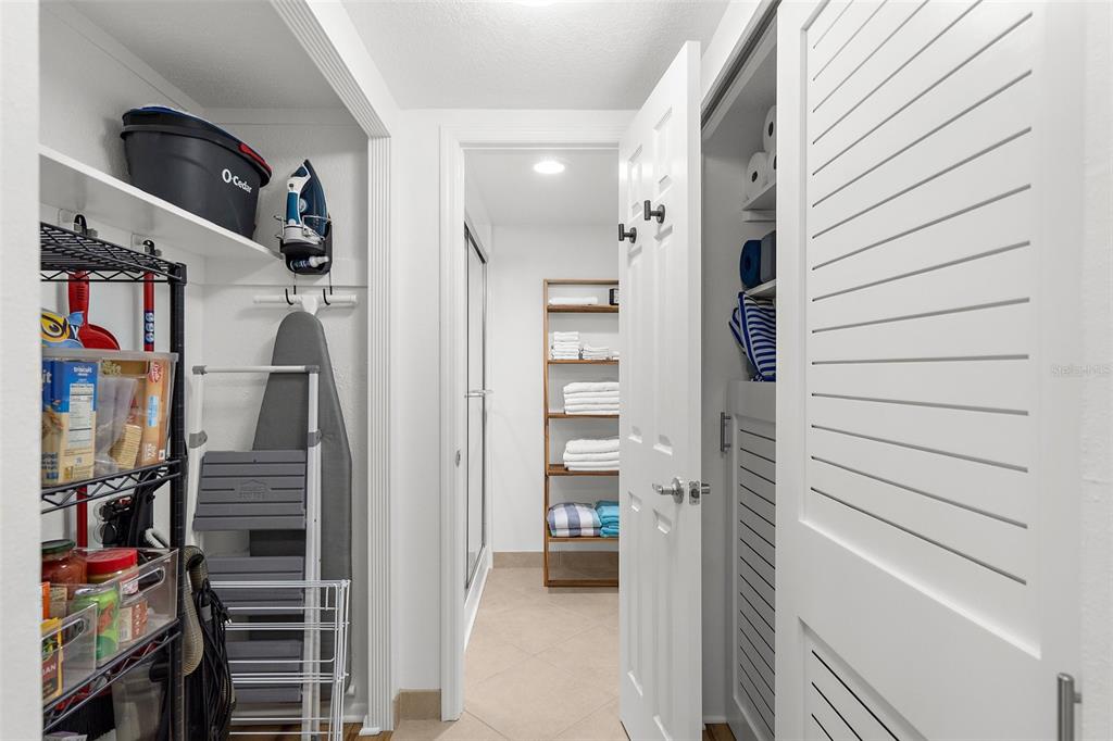 600 Sutton Place, Unit 101B Longboat Key, FL 34228 - Photo 22 of 53 a view of walk in closet