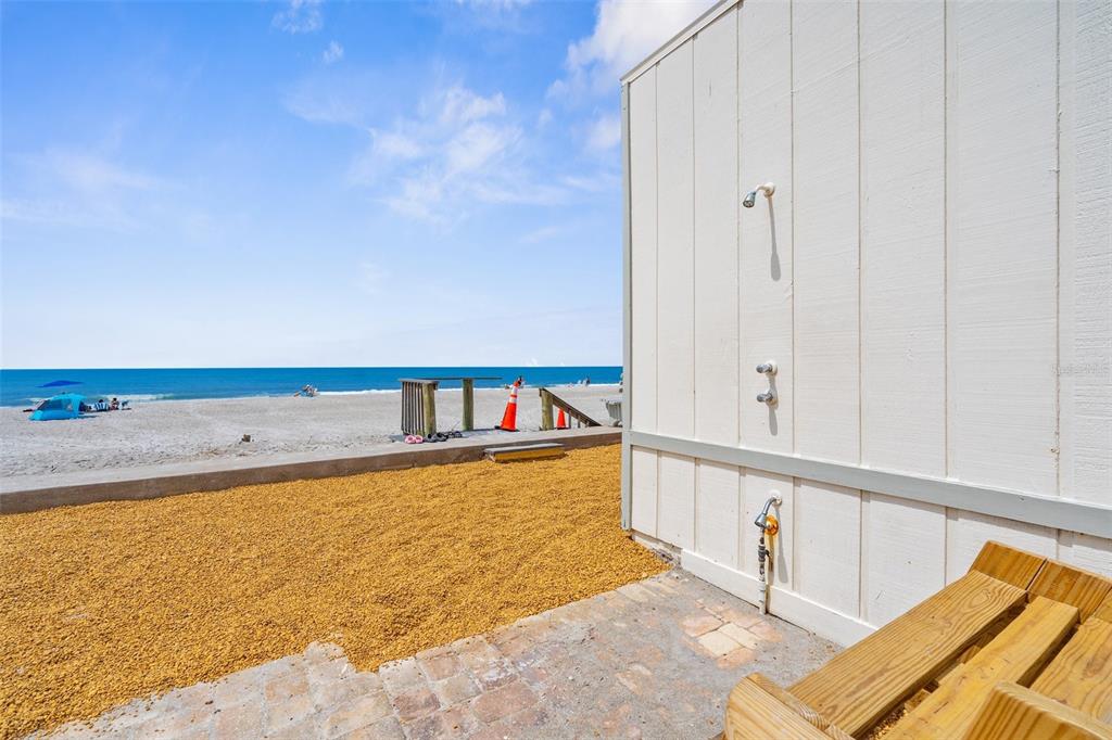 600 Sutton Place, Unit 101B Longboat Key, FL 34228 - Photo 40 of 53 a view of a swimming pool and an outdoor space