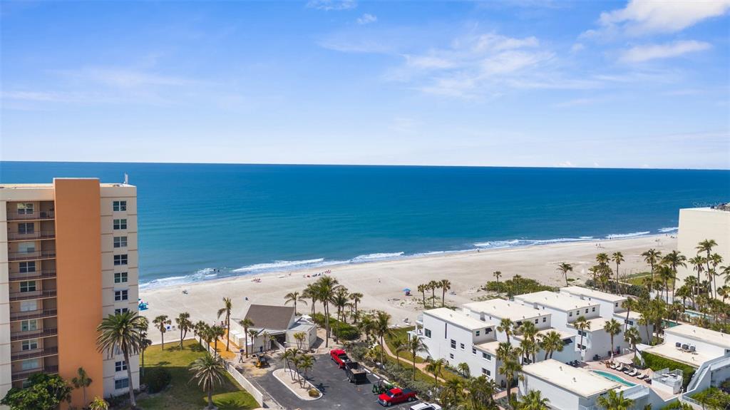 600 Sutton Place, Unit 101B Longboat Key, FL 34228 - Photo 45 of 53 an aerial view of beach and ocean