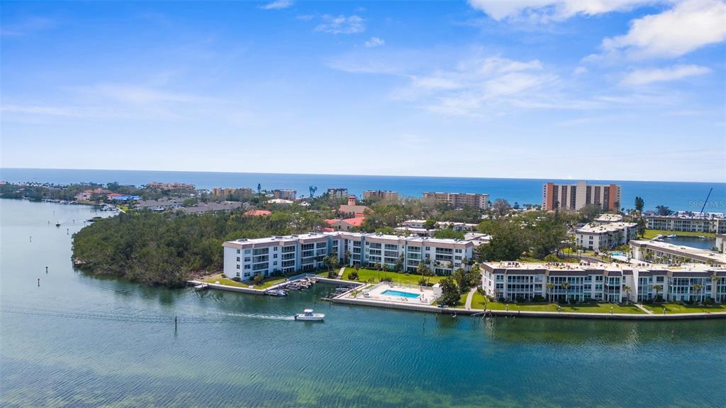 600 Sutton Place, Unit 101B Longboat Key, FL 34228 - Photo 48 of 53 an aerial view of a house with a ocean view