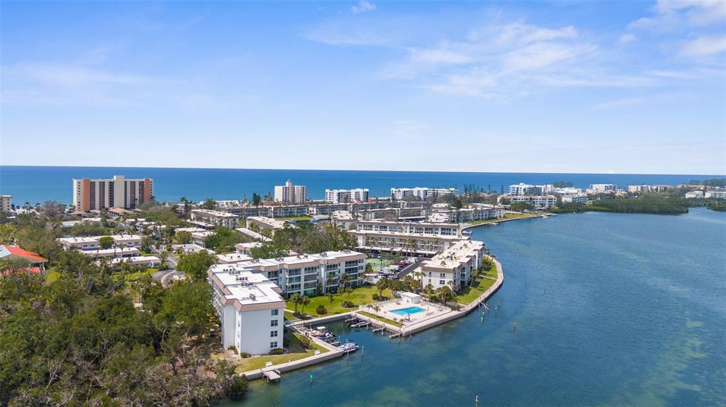 600 Sutton Place, Unit 101B Longboat Key, FL 34228 - Photo 51 of 53 a view of a city with tall buildings
