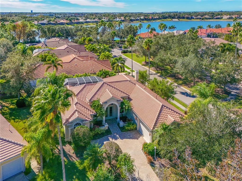 6602 Tallmast Circle Lakewood Ranch, FL 34202 - Photo 2 of 43 an aerial view of a house with a yard