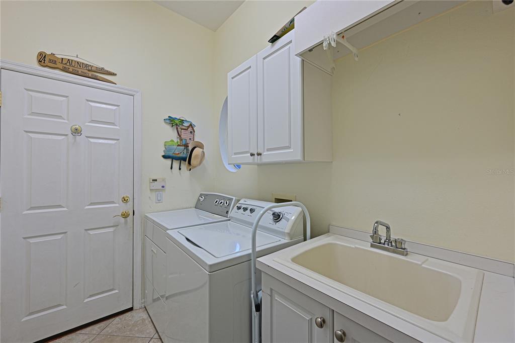 6602 Tallmast Circle Lakewood Ranch, FL 34202 - Photo 24 of 43 a bathroom with a sink and vanity