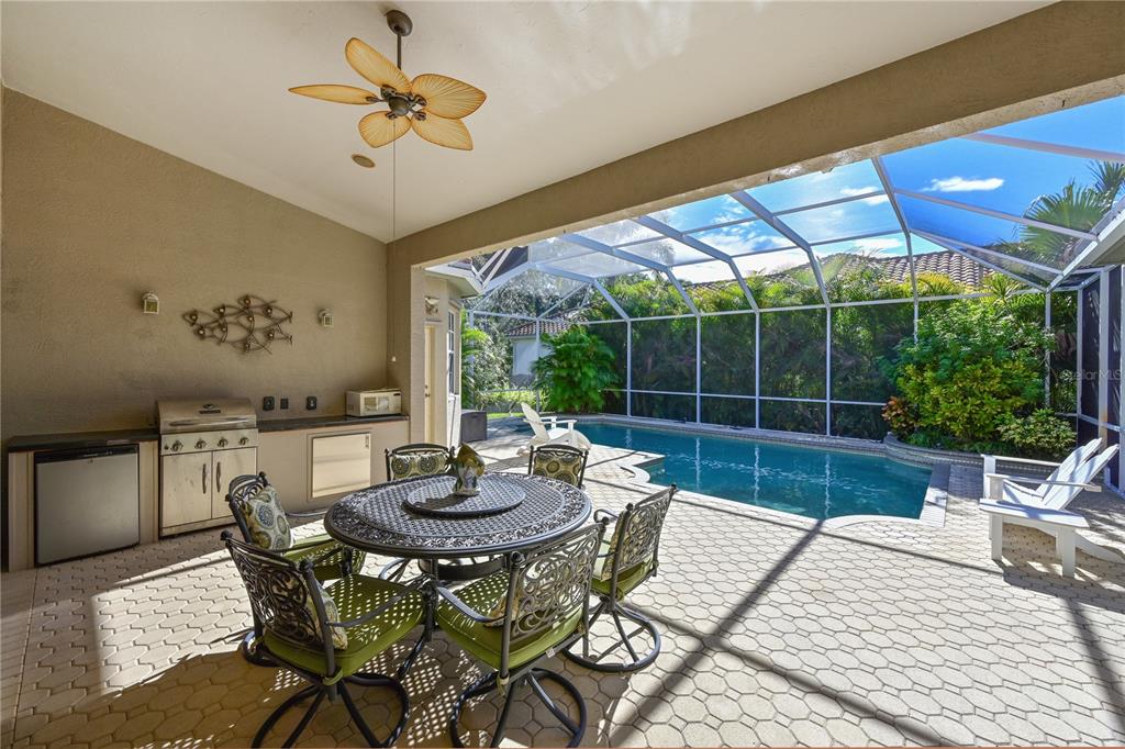 6602 Tallmast Circle Lakewood Ranch, FL 34202 - Photo 28 of 43 a view of a dining room with furniture window and outside view