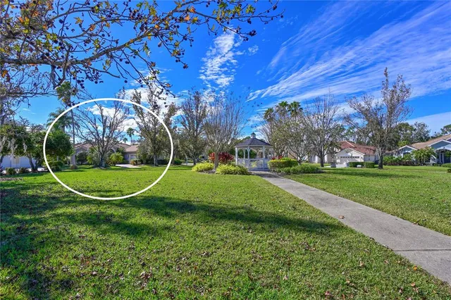 a view of a playground with basketball court