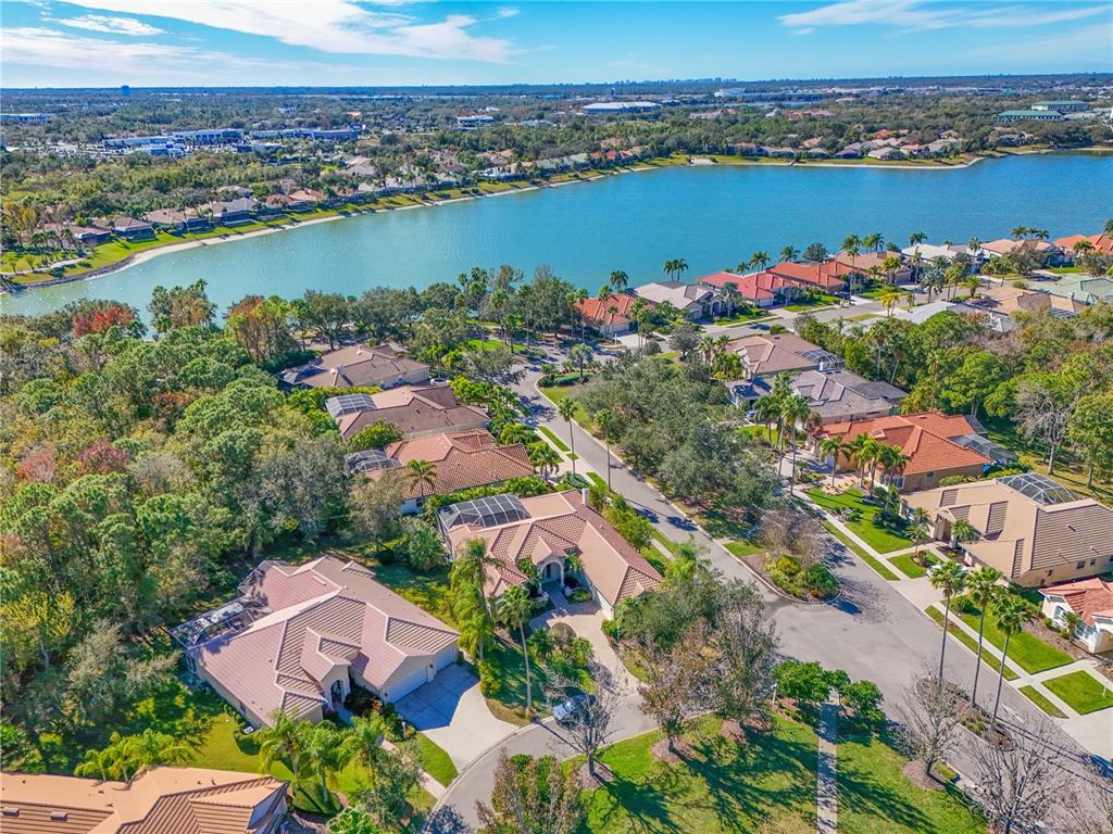 6602 Tallmast Circle Lakewood Ranch, FL 34202 - Photo 41 of 43 an aerial view of a city and lake view