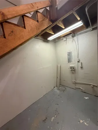 a view of an empty room with windows