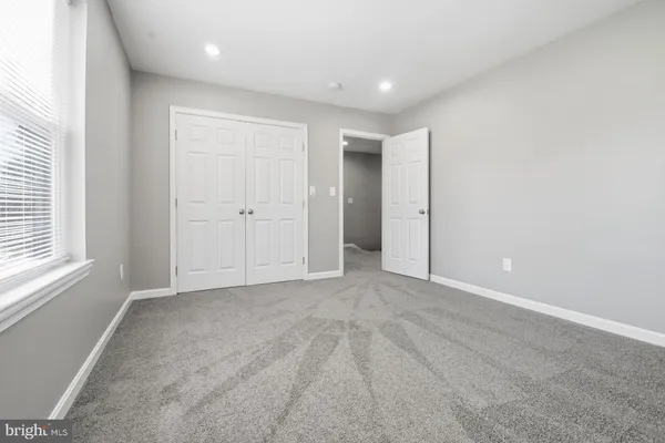 a view of a room with an entryway