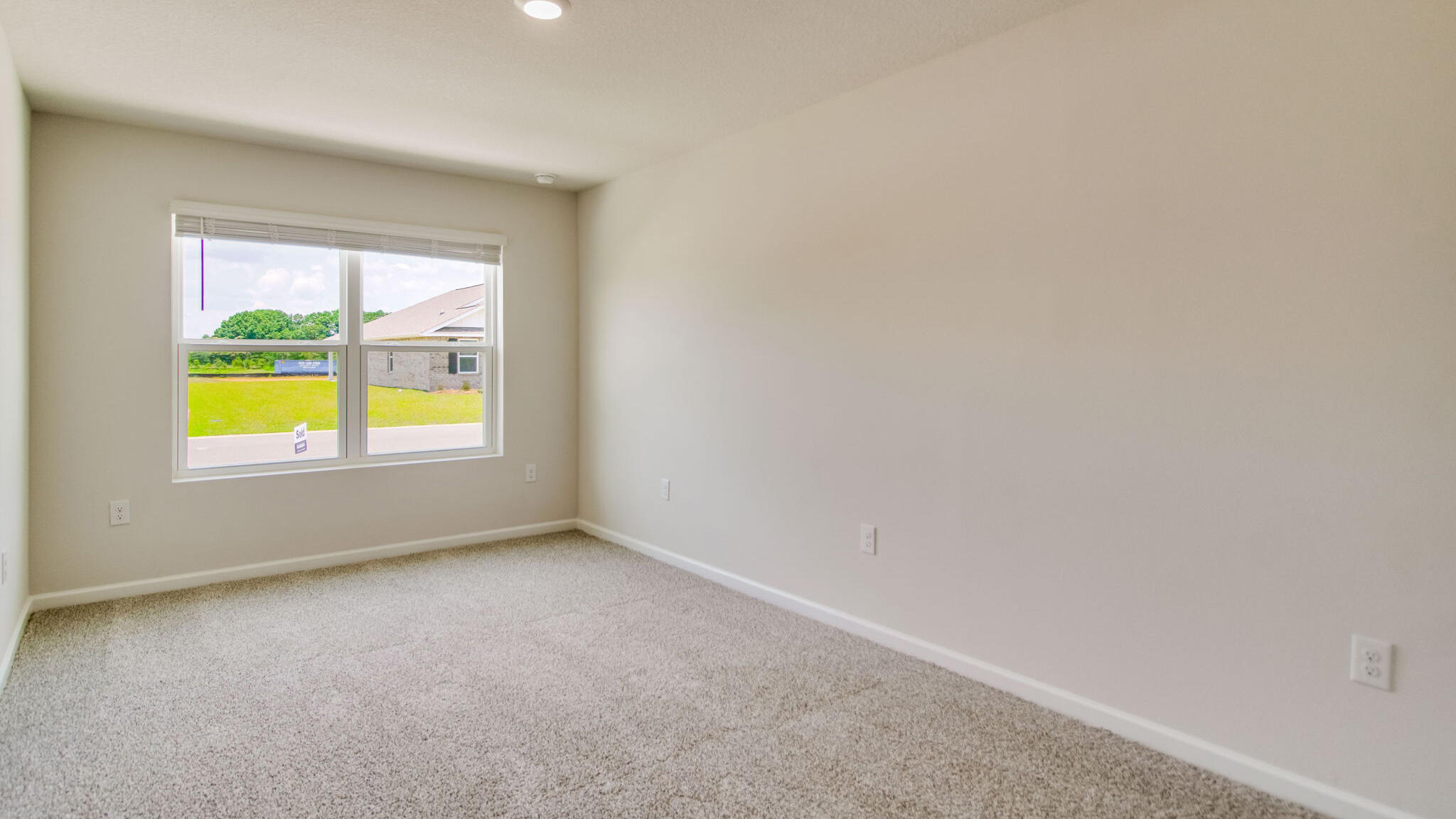 2512 Rutgers Road Crestview, FL 32536 - Photo 29 of 32 an empty room with a window