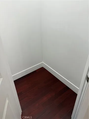 a view of small space with wooden floor