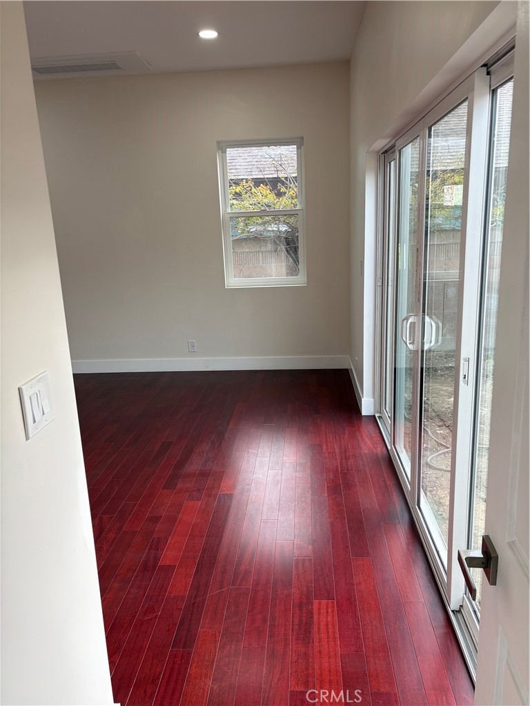 11862 Paseo Bonita Los Alamitos, CA 90720 - Photo 28 of 48 an entryway with wooden floor and windows
