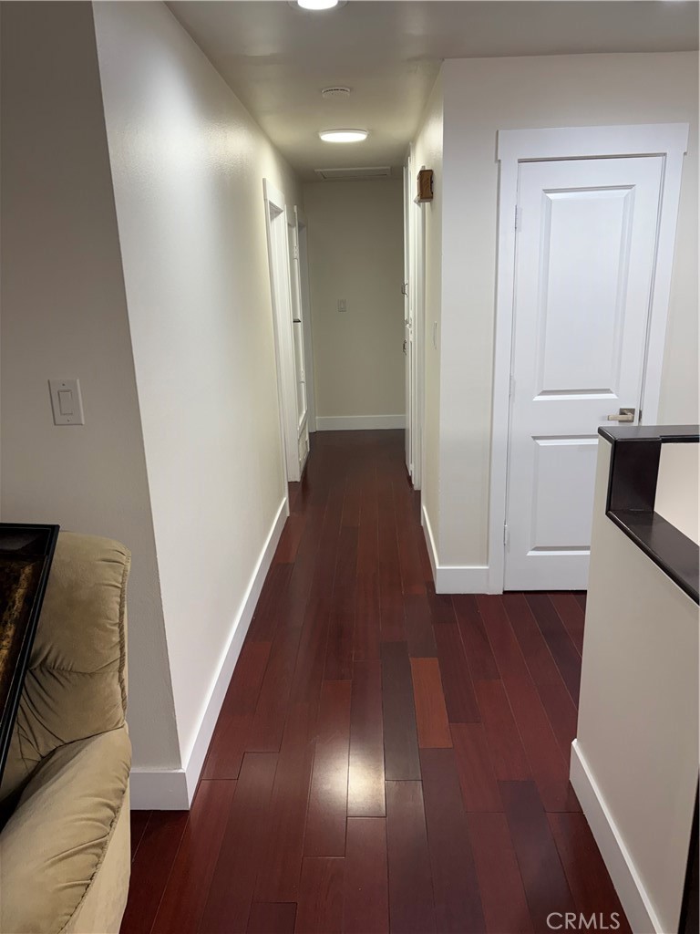 11862 Paseo Bonita Los Alamitos, CA 90720 - Photo 35 of 48 a view of a hallway with wooden floor