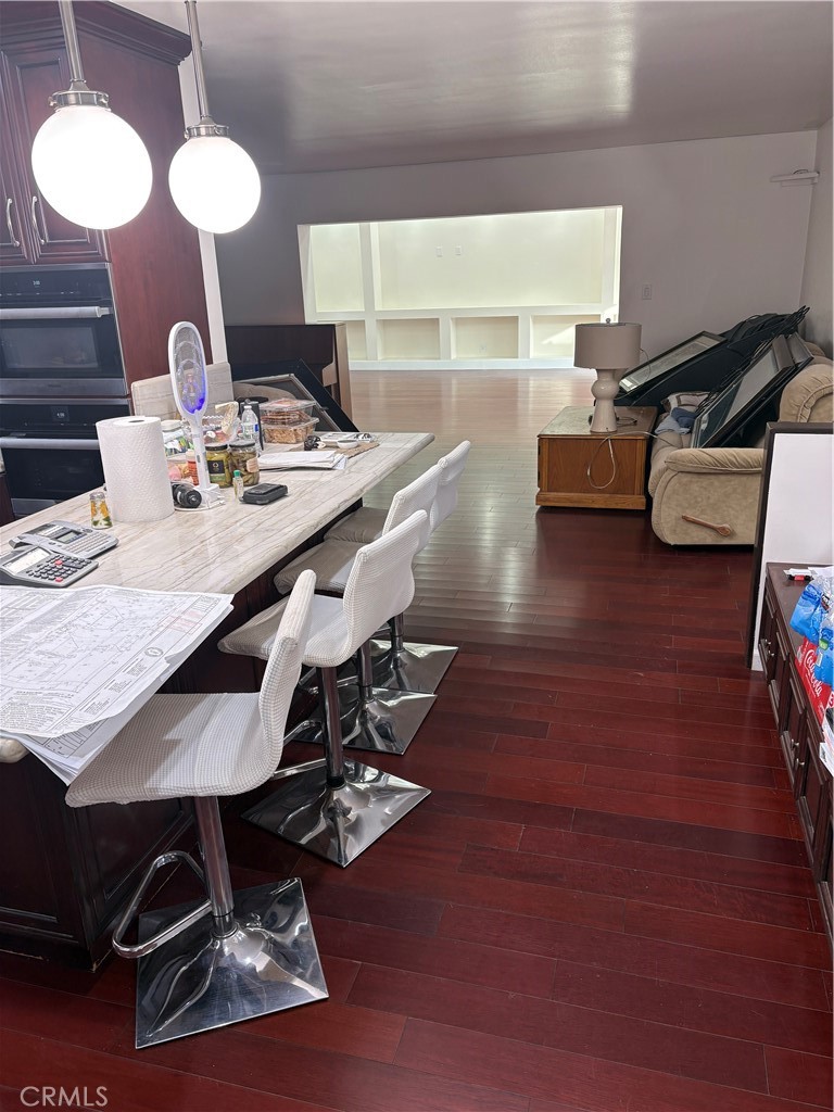 11862 Paseo Bonita Los Alamitos, CA 90720 - Photo 36 of 48 a dining room with furniture and wooden floor