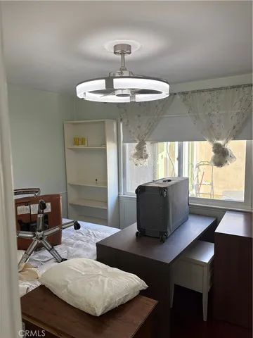 a bathroom with a sink toilet and mirror