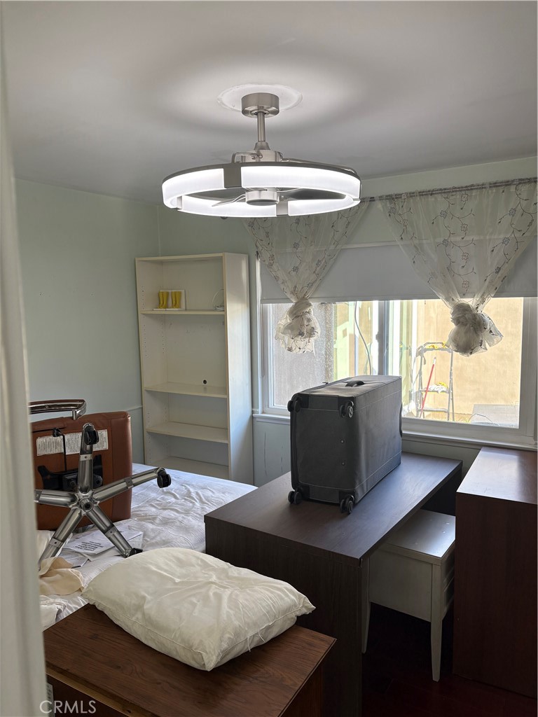 11862 Paseo Bonita Los Alamitos, CA 90720 - Photo 43 of 48 a living room with furniture and a wooden floor