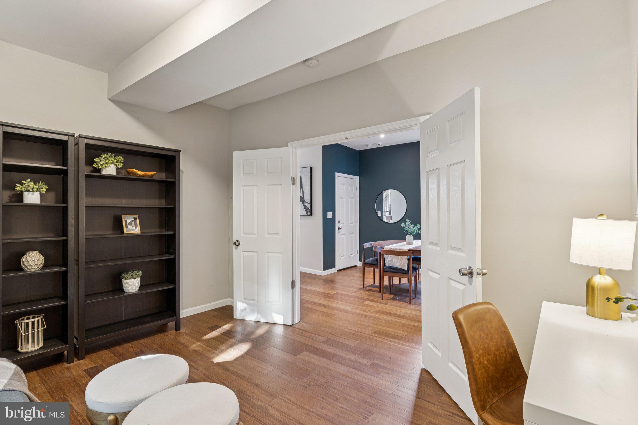 4001 Shepherd Street Brentwood, MD 20722 - Photo 12 of 39 a living room with furniture a rug and a chair