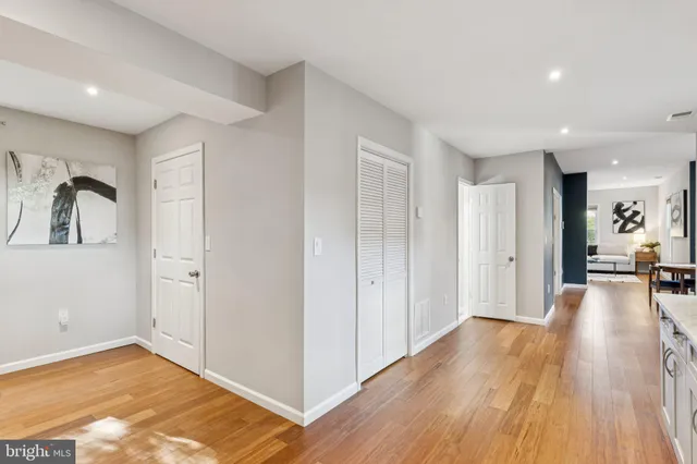 a view of a livingroom with wooden floor