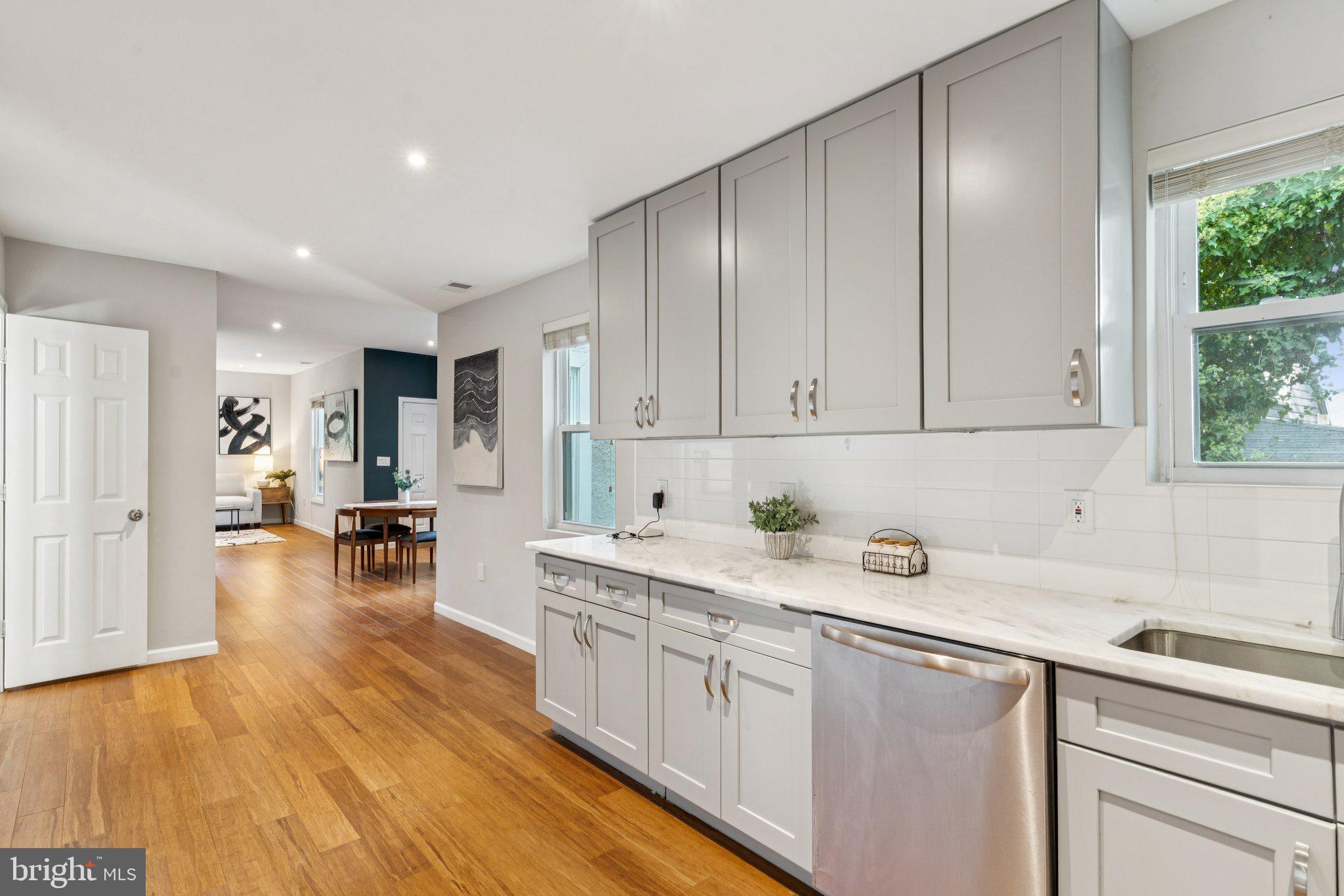 4001 Shepherd Street Brentwood, MD 20722 - Photo 16 of 39 a kitchen with a sink and cabinets