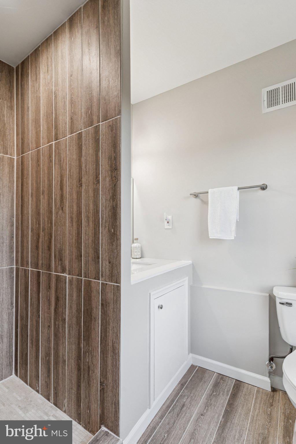 4001 Shepherd Street Brentwood, MD 20722 - Photo 27 of 39 a bathroom with a sink and a toilet