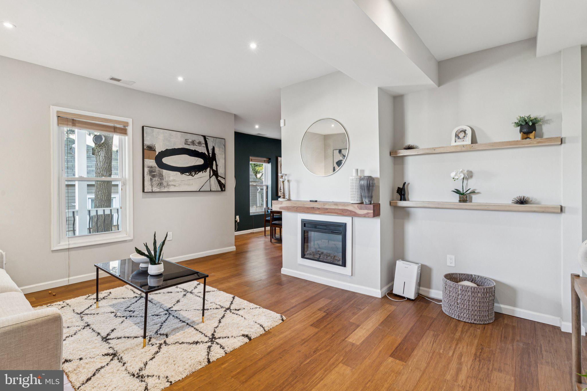 4001 Shepherd Street Brentwood, MD 20722 - Photo 3 of 39 a living room with furniture and wooden floor