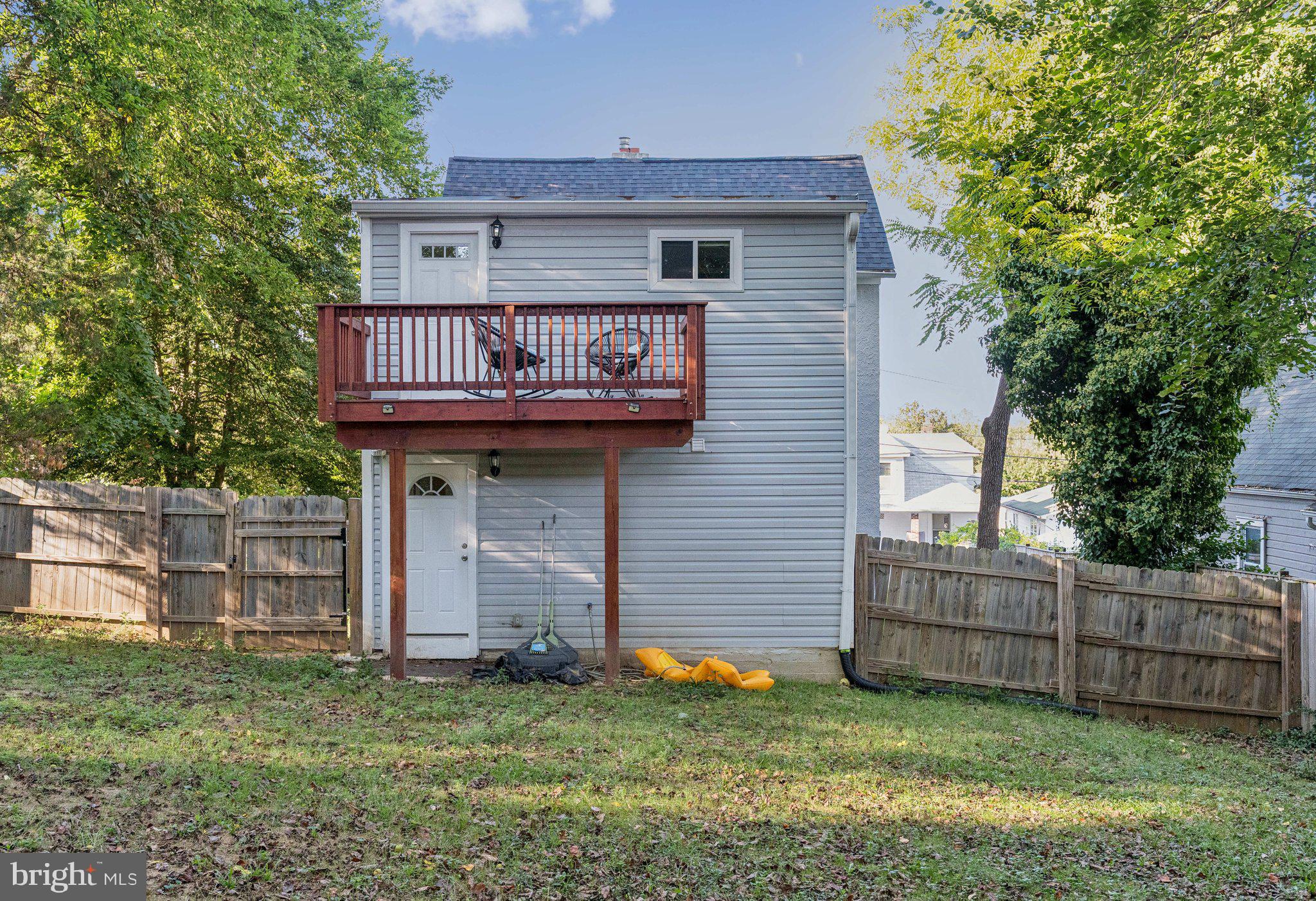 4001 Shepherd Street Brentwood, MD 20722 - Photo 34 of 39 a view of a house with a yard and wooden fence