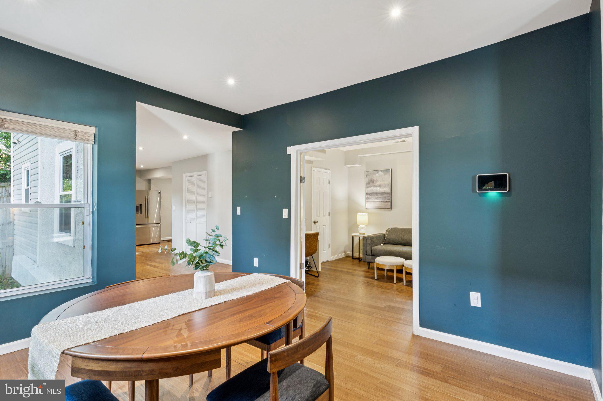 4001 Shepherd Street Brentwood, MD 20722 - Photo 9 of 39 a view of a dining room with furniture and wooden floor
