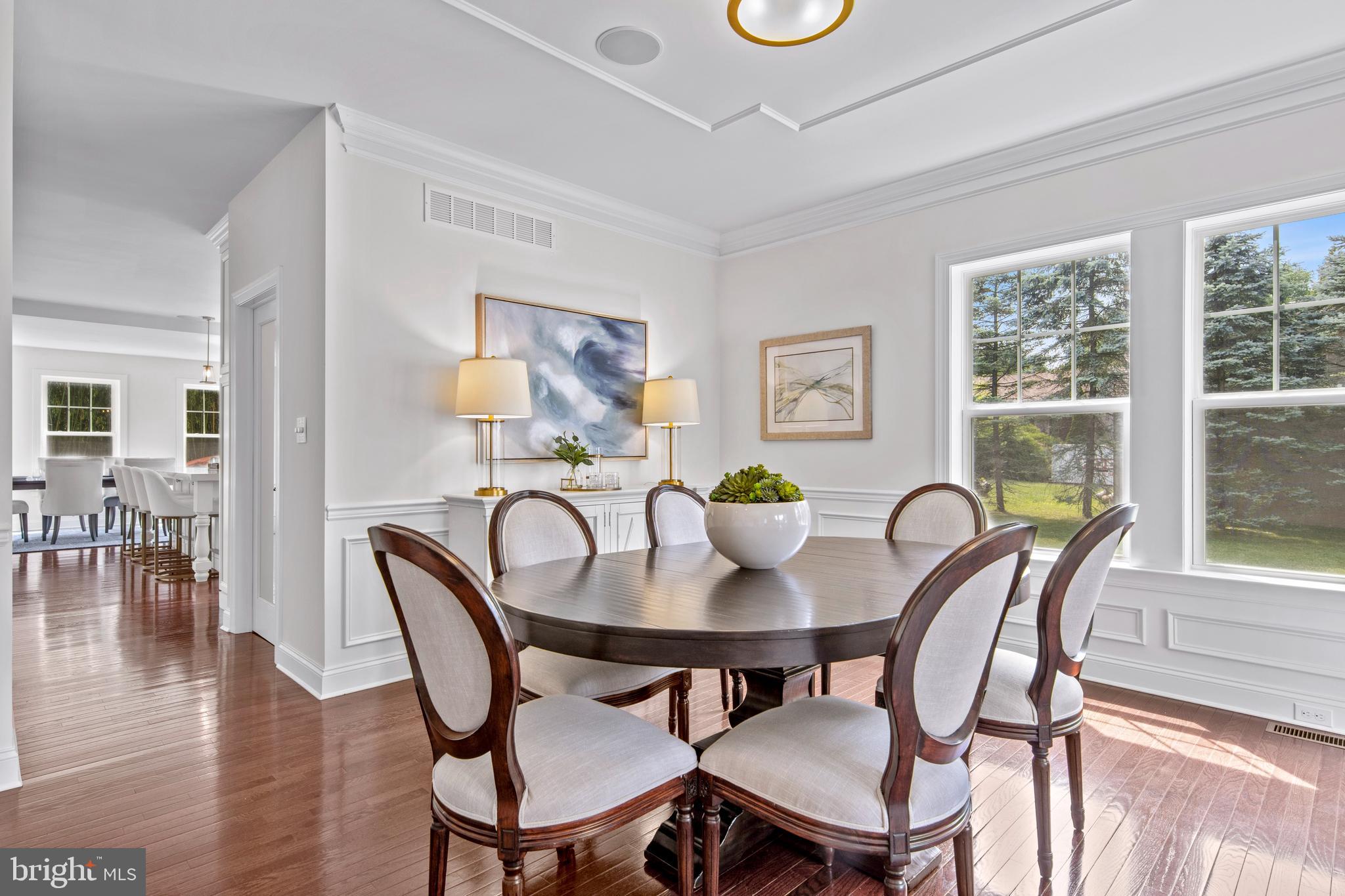 444 Conestoga Road Wayne, PA 19087 - Photo 12 of 82 a view of a dining room with furniture window and wooden floor